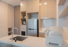 Common Space 6 Strategic and Modern Designed 1BR Apartment Arumaya Residence By Travelio