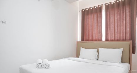 Bedroom 2 Elegant and Warm 1BR at Signature Park Grande Apartment By Travelio