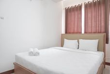 Bedroom Elegant and Warm 1BR at Signature Park Grande Apartment By Travelio