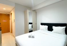 Bedroom 2 Cozy and Good Choice Studio at Tamansari Iswara Apartment By Travelio