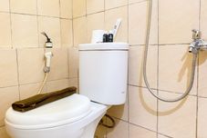 In-room Bathroom Elegant and Good Choice 2BR at Green Pramuka City Apartment By Travelio