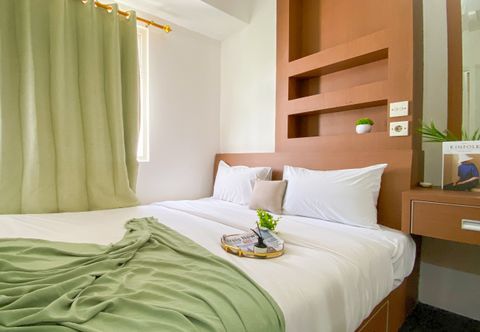 Bedroom Elegant and Good Choice 2BR at Green Pramuka City Apartment By Travelio