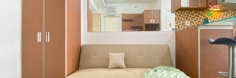 Lobby Elegant and Good Choice 2BR at Green Pramuka City Apartment By Travelio