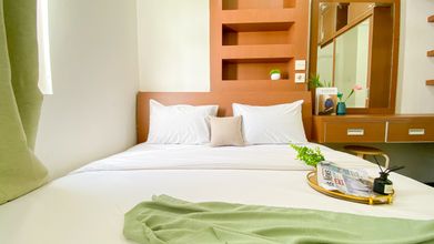 Bedroom 4 Elegant and Good Choice 2BR at Green Pramuka City Apartment By Travelio