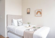 Bedroom 3 Homey Studio Apartment at Transpark Juanda Bekasi Timur By Travelio