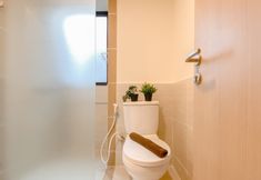 In-room Bathroom 7 Minimalist and Cozy 2BR Apartment at Meikarta By Travelio