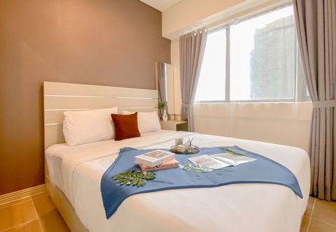 Bedroom Minimalist and Cozy 2BR Apartment at Meikarta By Travelio