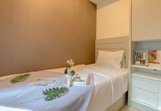 Bedroom 2 Minimalist and Cozy 2BR Apartment at Meikarta By Travelio