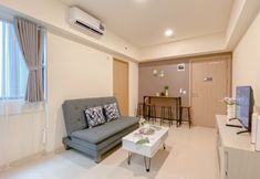Common Space 3 Minimalist and Cozy 2BR Apartment at Meikarta By Travelio