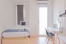 臥室 Cozy Stay Studio Apartment at Sudimara Forestwalk By Travelio