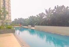 Swimming Pool 6 Cozy and Chic Studio at Apartment Transpark Cibubur By Travelio