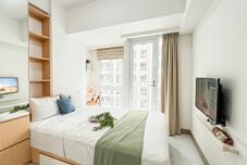 Bedroom Enjoy Living and Good Studio at Tokyo Riverside PIK 2 Apartment By Travelio