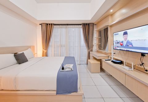 Bedroom Cozy and Good Furnished Studio at Casa de Parco Apartment By Travelio