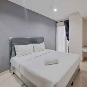 Bedroom 1 Minimalist and Simply 1BR at Patraland Amarta Apartment By Travelio, Warung Bu Trimah Hotels