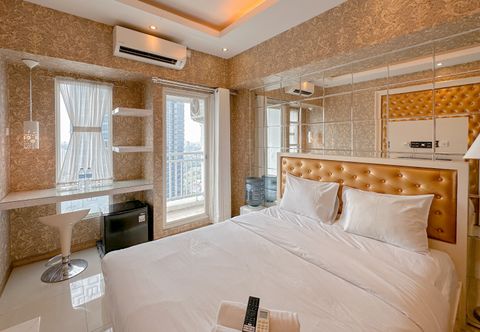 Bedroom Studio with Accses to Pakuwon Mall at Apartment Orchard Supermall Mansion By Travelio