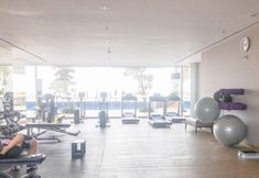 Fitness Center 7 Studio with Accses to Pakuwon Mall at Apartment Orchard Supermall Mansion By Travelio