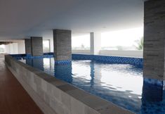 Kolam Renang 2 Simply Look 2BR Poris 88 Apartment By Travelio