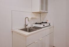 Ruang Umum 7 Simply Look 2BR Poris 88 Apartment By Travelio