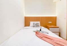 Bedroom 2 Spacious 2BR at Apartment Meikarta By Travelio