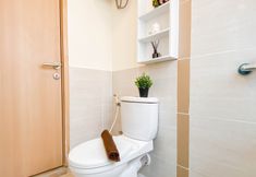 In-room Bathroom 7 Spacious 2BR at Apartment Meikarta By Travelio
