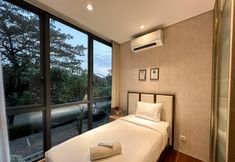 臥室 7 Tranquil and Modern Haven 2BR at Apartment The Rosebay By Travelio