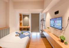 Bedroom 4 Warm and Neat Studio at Tokyo Riverside PIK 2 Apartment By Travelio