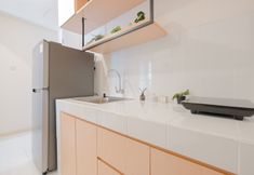 Common Space 4 Neat 2BR at Apartment Tokyo Riverside PIK 2 By Travelio