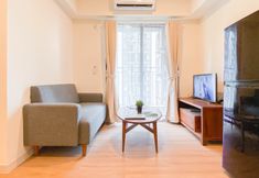 Common Space 4 Cozy and Warm 1BR with Makeup Room at Meikarta Apartment By Travelio