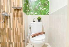 In-room Bathroom 7 Tidy and Comfort 2BR with Extra Room Apartment Meikarta By Travelio