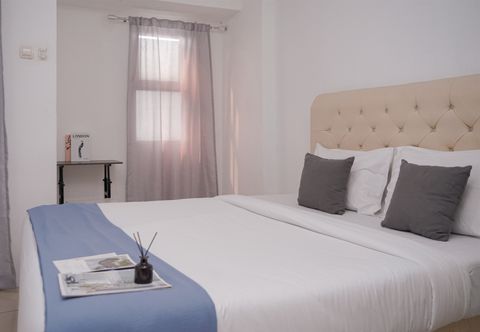 Bedroom Simple Studio Room at Apartment Urbantown Serpong By Travelio
