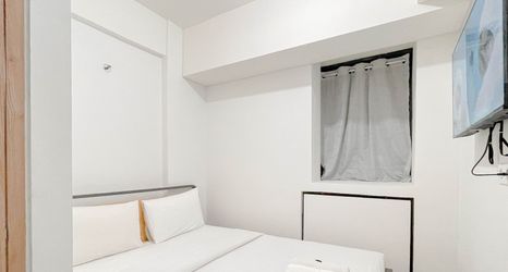 Kamar Tidur 2 Affordable and Cozy 1BR Combined (No Kitchen) Bandaraya - Tallasa City Makassar Apartment By Travelio