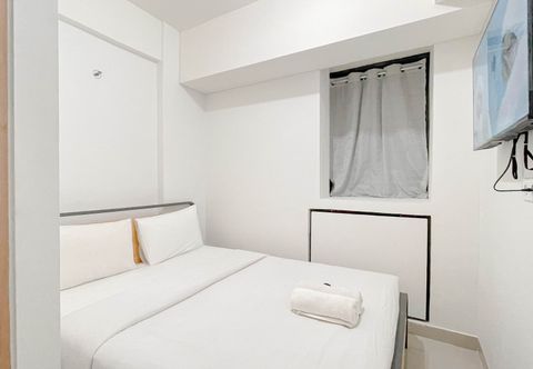 Kamar Tidur Affordable and Cozy 1BR Combined (No Kitchen) Bandaraya - Tallasa City Makassar Apartment By Travelio