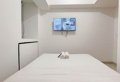 Kamar Tidur 2 Affordable and Cozy 1BR Combined (No Kitchen) Bandaraya - Tallasa City Makassar Apartment By Travelio