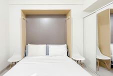 Bedroom White Studio (No Kitchen) at Bandaraya - Tallasa City Makassar Apartment By Travelio