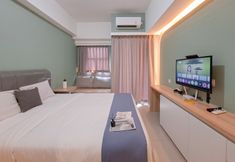 臥室 3 Simple Neutral Toned Studio at Parkland Avenue Apartment By Travelio