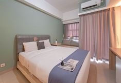 臥室 2 Simple Neutral Toned Studio at Parkland Avenue Apartment By Travelio