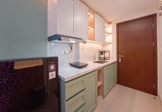 公共空間 5 Simple Neutral Toned Studio at Parkland Avenue Apartment By Travelio