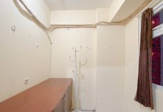 Bedroom 5 Comfy and Combined 1BR with Extra Room Apartment at Green Pramuka City By Travelio