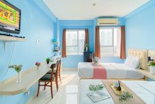 Bilik Tidur Blue Accent Studio (No Kitchen) at Elvis Tower Apartment By Travelio