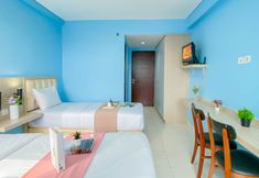 Bilik Tidur 2 Blue Accent Studio (No Kitchen) at Elvis Tower Apartment By Travelio