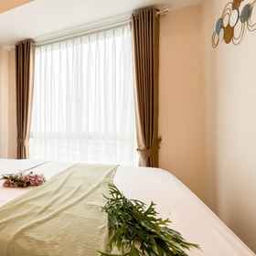 Bedroom 1 White Toned Style and Simple 2BR Tokyo Riverside PIK 2 Apartment By Travelio, Tangerang Hotels