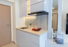 Common Space 5 Minimalist Tidy and Good 2BR at Meikarta Apartment By Travelio