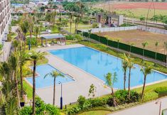 Kolam Renang 5 Minimalist Modern Earth Tone Studio at Sky House BSD Apartment By Travelio