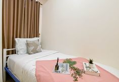 Bedroom 3 2BR Apartment near Pelita Bangsa University at Meikarta By Travelio