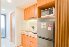 Common Space 2 Modern Touch 2BR at Meikarta Apartment By Travelio