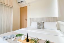 Bedroom Spacious 3BR Apartment with Neutral Toned at Meikarta By Travelio