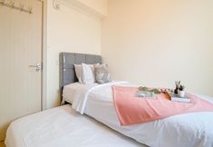 Bedroom 6 Scandinavian Soft 3BR at Meikarta Apartment By Travelio