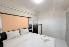 Bedroom 2 Strategic 2BR near ITS Campus at Dian Regency Apartment By Travelio