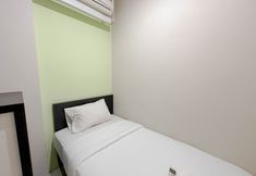 Bedroom 3 Strategic 2BR near ITS Campus at Dian Regency Apartment By Travelio