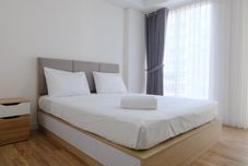 Bedroom Modern Studio at Landmark Residence Bandung Apartment By Travelio